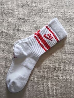 Nike White Crew Socks with Red Stripes and Swoosh